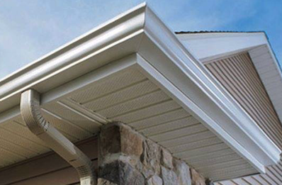 A close up shot of an eave and gutter on a residential property in Pasco County.  Gutter repair done by Trinity Roofers.